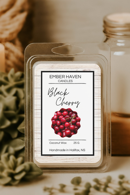 Ember Haven Candles Black Cherry wax melt packaging with a candle and jar in the background