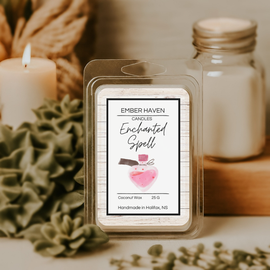 Ember Haven Candles Enchanted Spell wax melt packaging with a candle and jar in the background